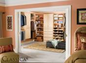 Closet organization never looked better!  Elegant closet storage in maple laminate.