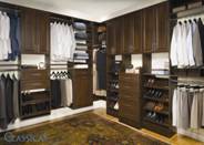 This large walk-in master closet has special his and hers storage in rich looking Chocolate Pear.