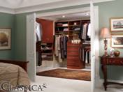 This walk-in master closet is customized with units tailored for every need.